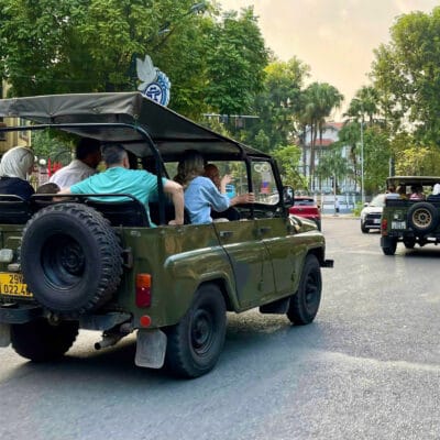 "Ride through a vibrant mix of old-world beauty and fast-paced street life in a rugged, retro-style Jeep."